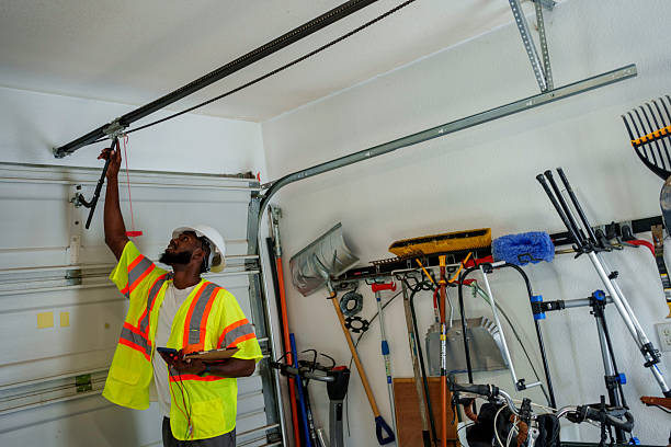 Professional Garage Door Maintenance technician working in Petersburg, IN